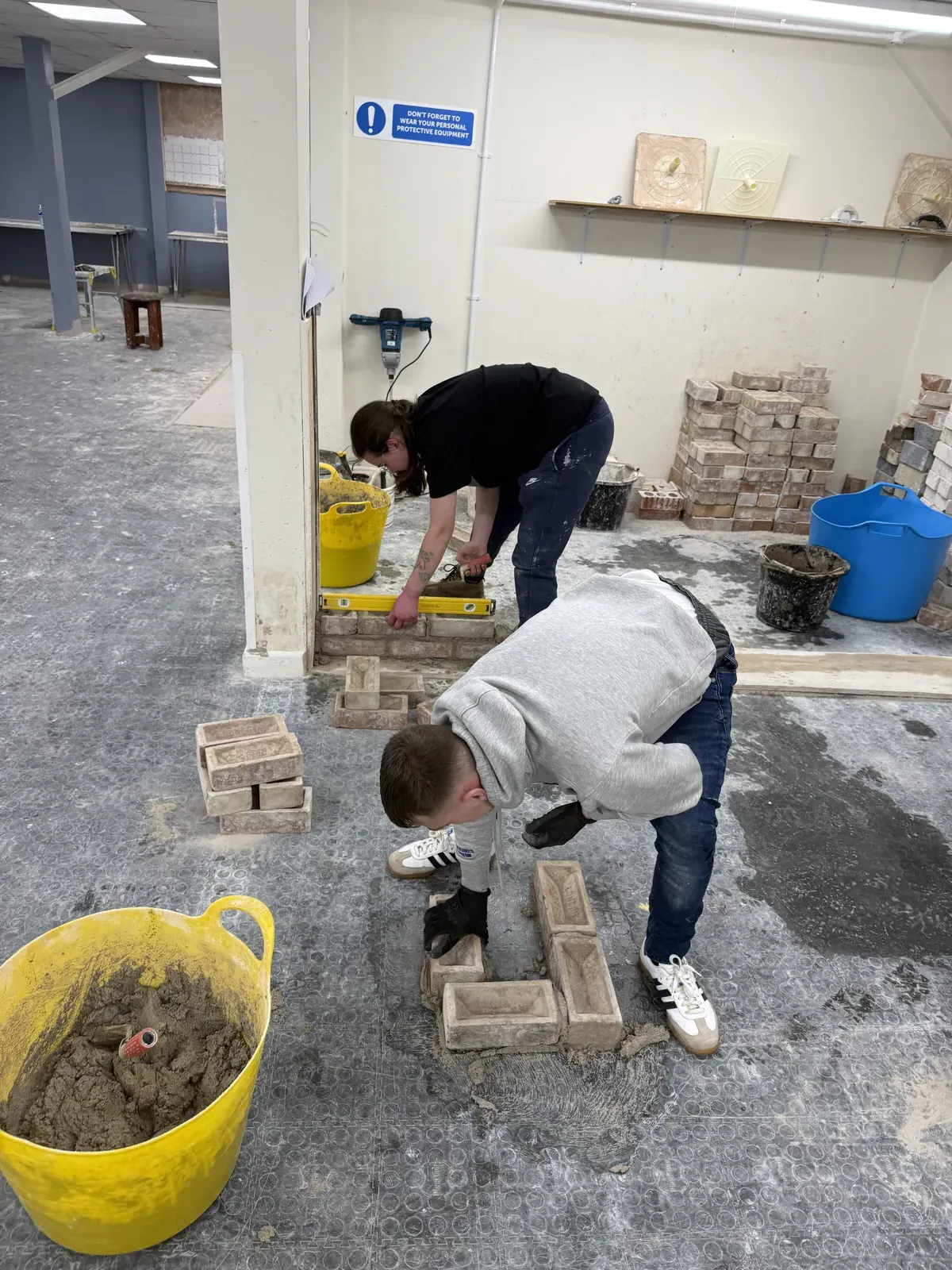 Learner bricklaying in the workshop